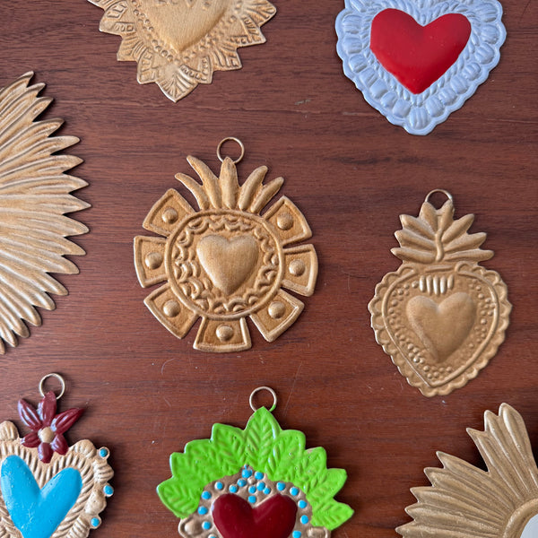 Ex-voto doré Ray accroché au mur