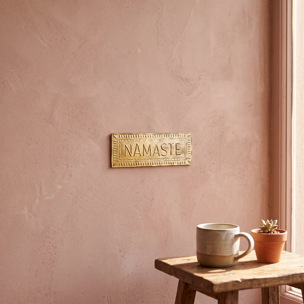 Plaque murale doré NAMASTE