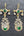 Boucles d'oreilles Kuchi afghanes vertes en métal artisanal, vue de face