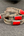 Bracelet ajustable Nuristan Afghanistan porté au poignet, pierre rouge