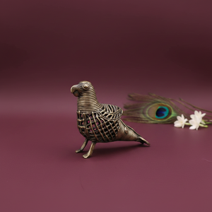 KIFF KIFF handcrafted Dhokra brass parrot figurine with intricate wirework, made in Odisha, India.