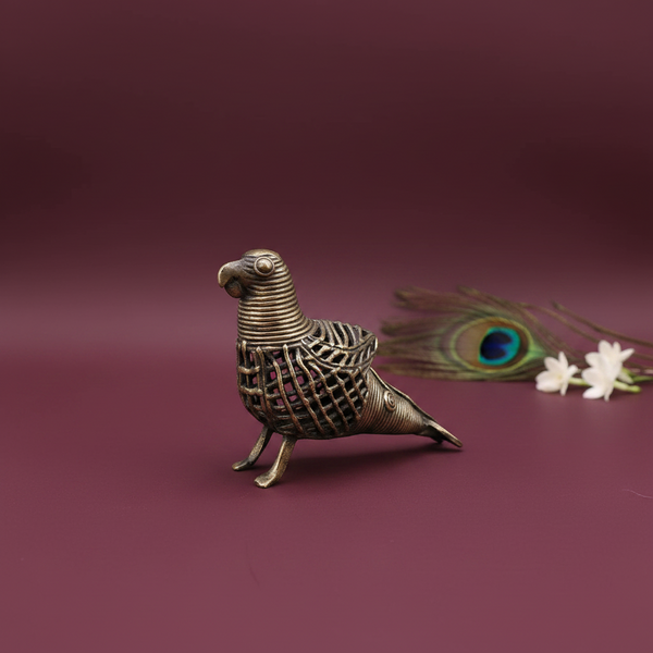 KIFF KIFF handcrafted Dhokra brass parrot figurine with intricate wirework, made in Odisha, India.