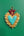 Ex-voto KIFF KIFF Betty en forme de cœur sacré doré avec centre turquoise et fleur bordeaux, fait main en métal.