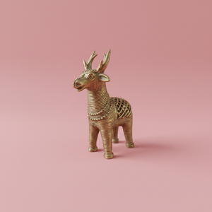 KIFF KIFF gold-toned metal deer statuette with intricate wire-wrapped texture on a soft pink background.