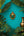 Masque mural artisanal Jambaban KIFF KIFF en papier mâché jaune et vert, décoré de motifs traditionnels d'Odisha.