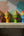 Quatre statuettes KIFF KIFF en papier mâché représentant des visages hindous colorés peints à la main sur une étagère