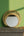 KIFF KIFF Zoya circular wall mirror with a decorative gold metal frame, 26 cm diameter, handcrafted in India.