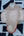 Masque Ganesh blanc accroché au mur, décoration Odisha