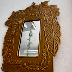 Miroir léopard doré jungle, vue de détail