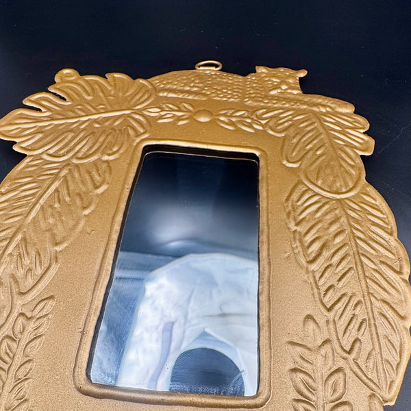Miroir léopard doré jungle, gros plan artisanal